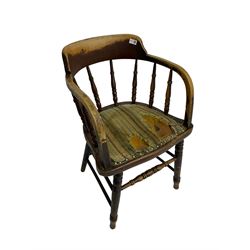 Late 19th/early 20th century beech armchair, curved arms on spindle back, on turned supports