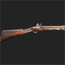 English flintlock blunderbuss, circa 1780 by R. Sutherland of London, the 32cm brass barrel with proof marks and London to the top, with original ramrod with brass tip below, the lock engraved Sutherland, walnut stock with brass butt plate, steel trigger guard with acorn finial, overall L70cm  
