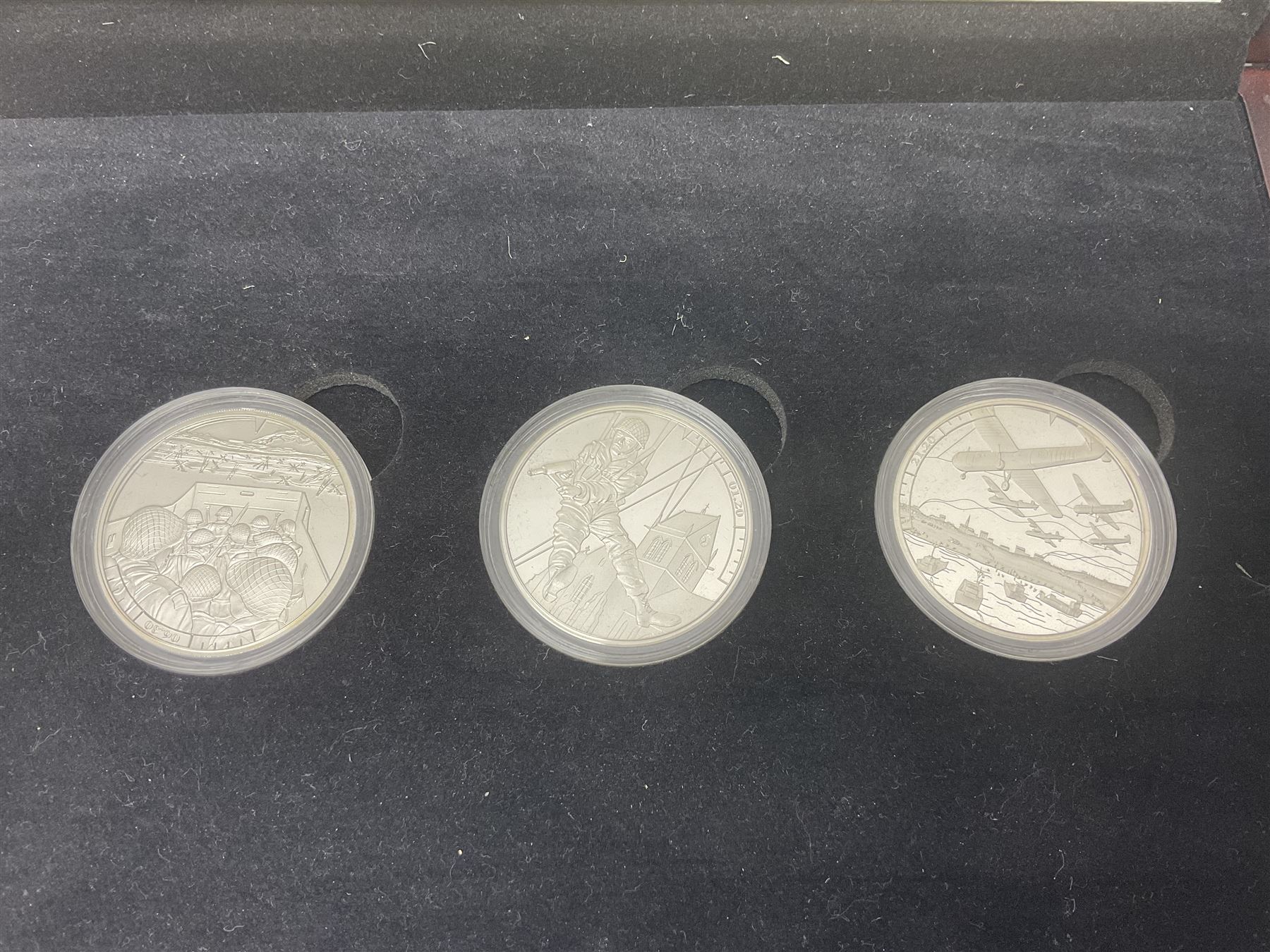 Queen Elizabeth II Channel Islands and Isle of Man silver proof five pound coins, comprising Bailiwick of Jersey 2016 'Lest we Forget', 2019 'D-Day 75th Anniversary' three coin set', Bailiwick of Guernsey 2020 'Florence Nightingale 200th Anniversary' and Isle of Man 2021 'William and Kate Wedding Anniversary', all cased with certificates