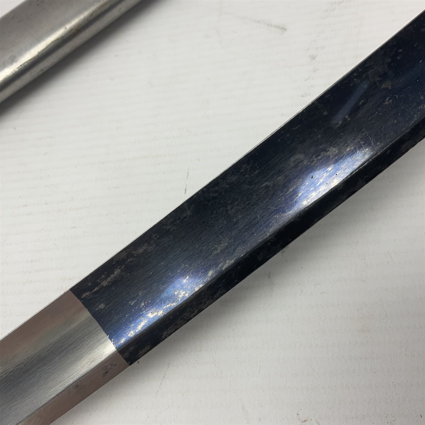 Early 19th century French Lancers officer's sword c1810, the 84cm curving fullered blade retaining most of its bluing, gilding and engraved decoration, inscribed I.S.& C. to ricasso (for Schimelbusch), brass three-bar hilt with elongated elliptical langets and wire-bound leather grip; in polished steel scabbard with two brass suspension rings L100cm overall