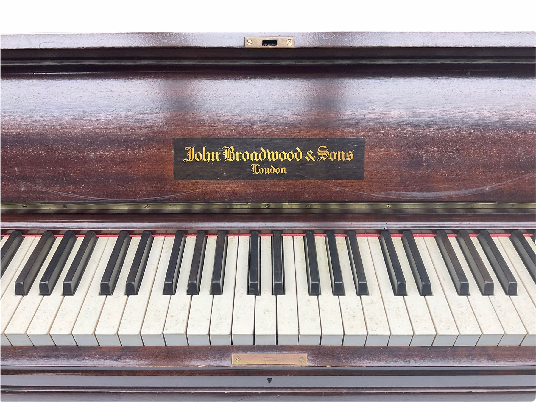 John Broadwood & Sons London upright piano, iron framed and overstrung movement, in mahogany case