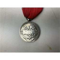 Five continental medals - WW1 Belgian Cross of Fire; WW1 French Croix De Guerre; French Croix De Combattant; French Republic Workers silver merit awarded to L. Mounet 1950; and boxed French Palmes Universitaires Officier d'Academie silver and enamel wreath (5)