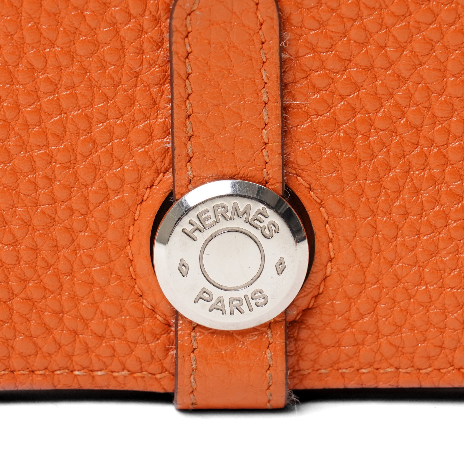 Hermès - Dogon Duo wallet, orange Togo leather, with palladium-plated Clou de Selle fastening, detachable zipped coin purse and fitted interior, stamped 10N H, with original box