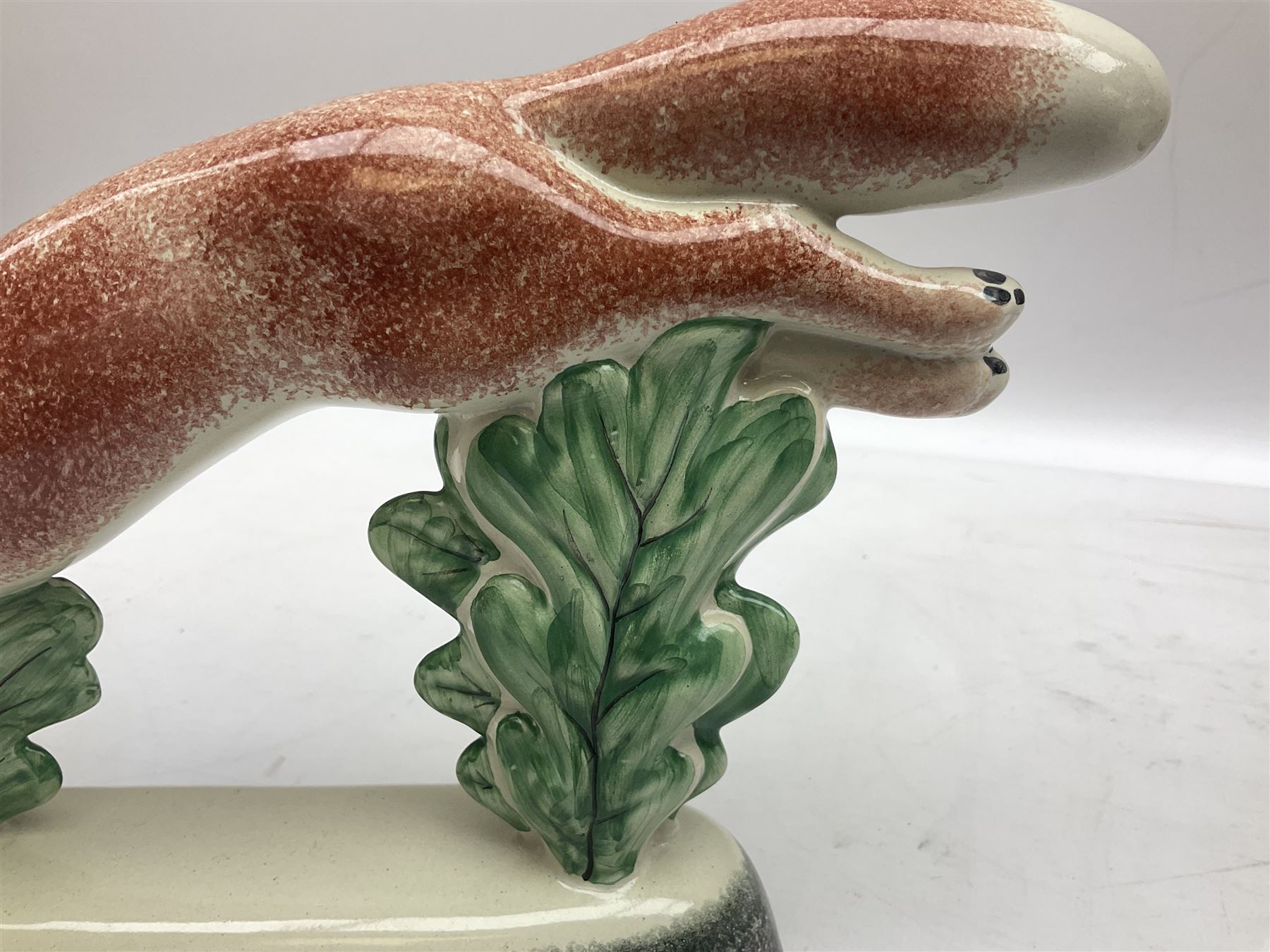 Six Rye Pottery figures, comprising, jumping fox, squirrel upon a branch, billy goat, bull, chicken and cockerel  