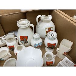 Collection of W H Goss crested ware, to include Yorkshire Roman Ewer, Scarborough ancient jug, salt and pepper shakers, Norwegian horse shaped beer bowl, The Old Horse Shoe, etc, together with five Shelley examples modelled as piano, boat, heart shaped box, etc, in two boxes 
