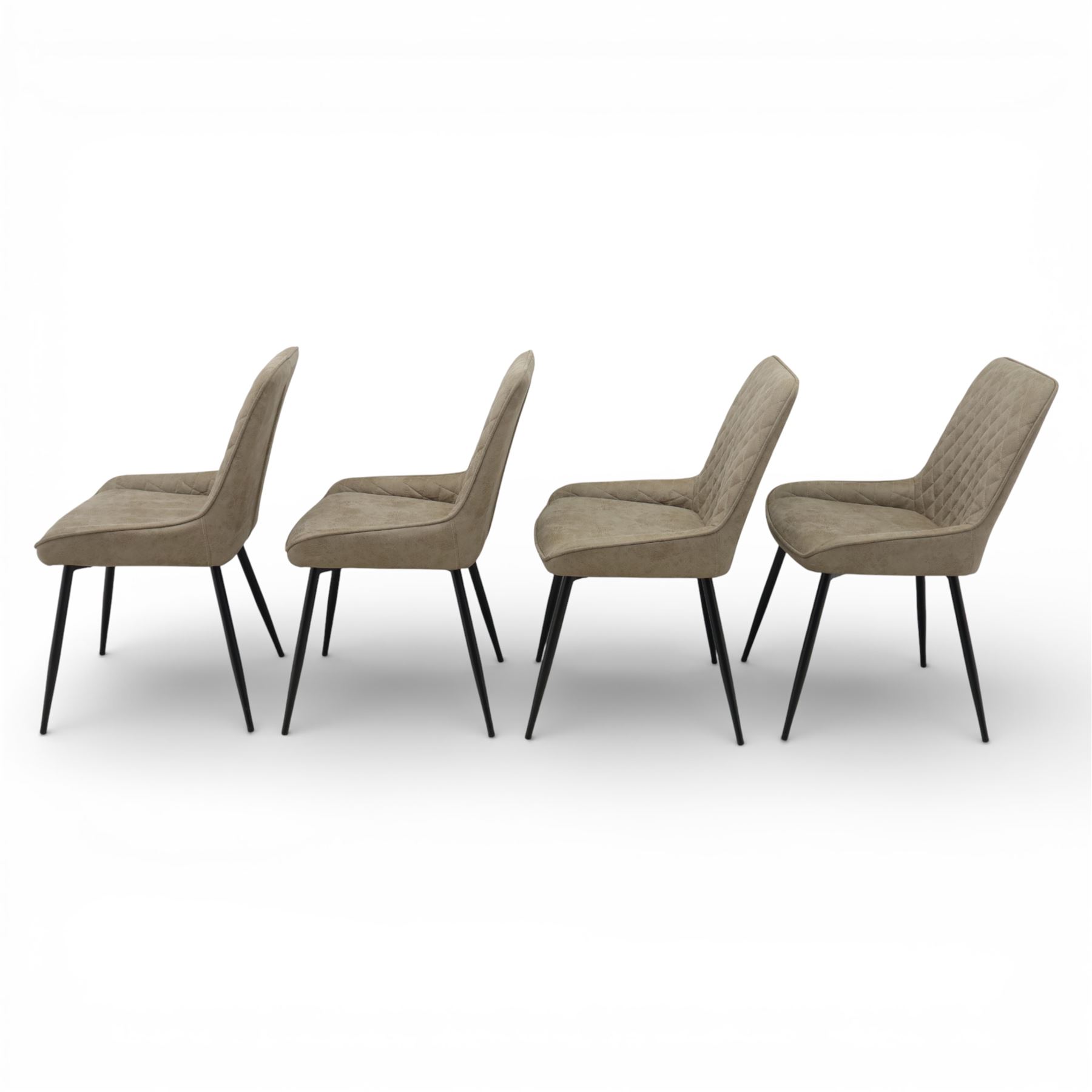 Next Home - ‘Monza’ design set of four dining chairs, upholstered in mink-toned faux leather with diamond quilted backs and plain padded seats, shaped backs with integrated side wings, raised on black painted tapering metal supports
