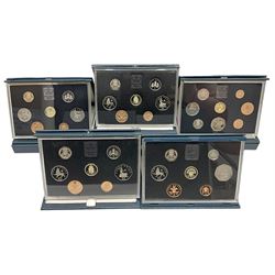 Nine The Royal Mint United Kingdom proof coin collections, dated two 1984, 1985, 1986, two 1988, 1989, 1990 and 1991, all in blue cases with certificates
