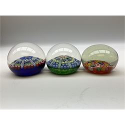 Five Millefiori glass paperweights, of differing designs, predominately by Strathearn