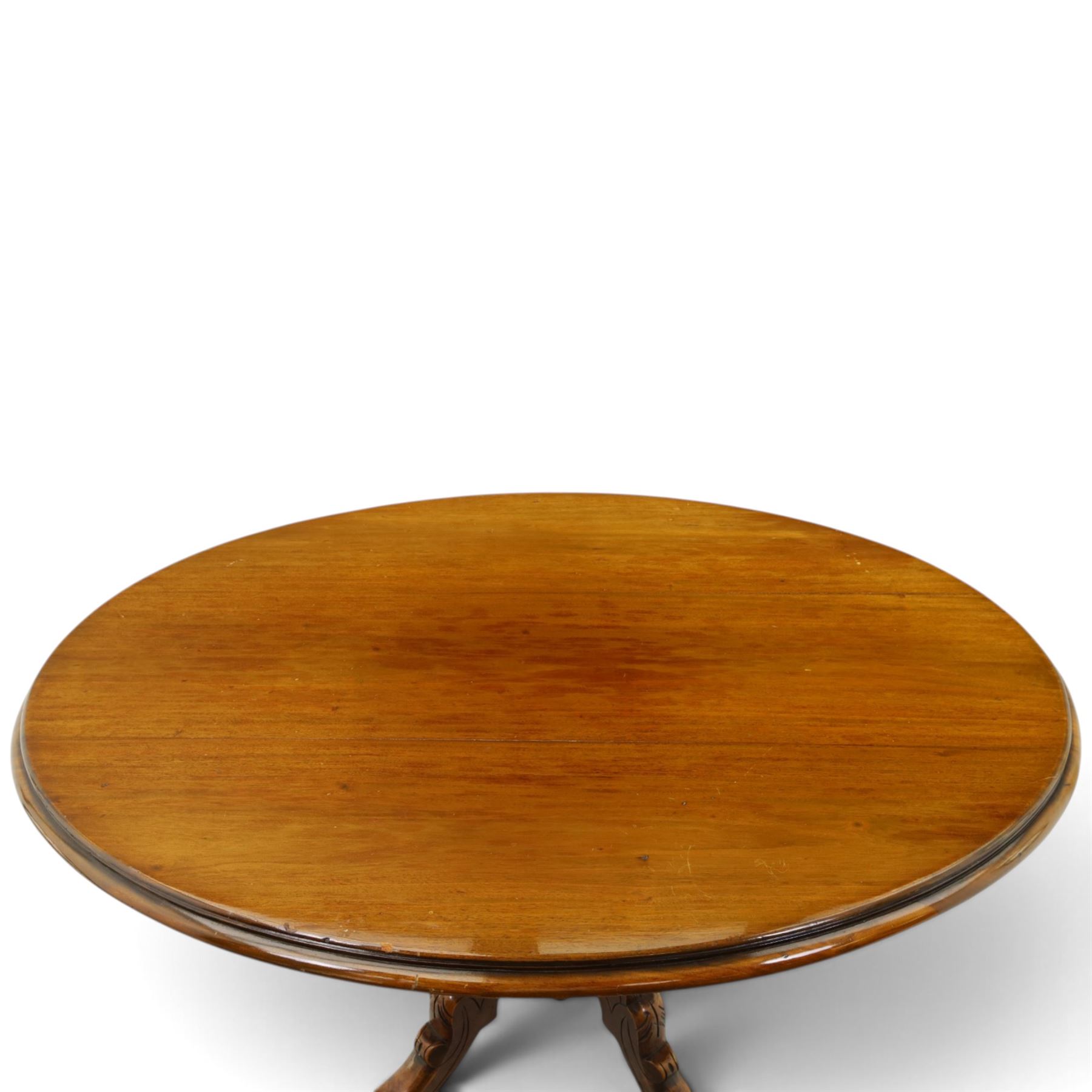Victorian mahogany oval centre table, turned base with four carved splay legs (no fittings)