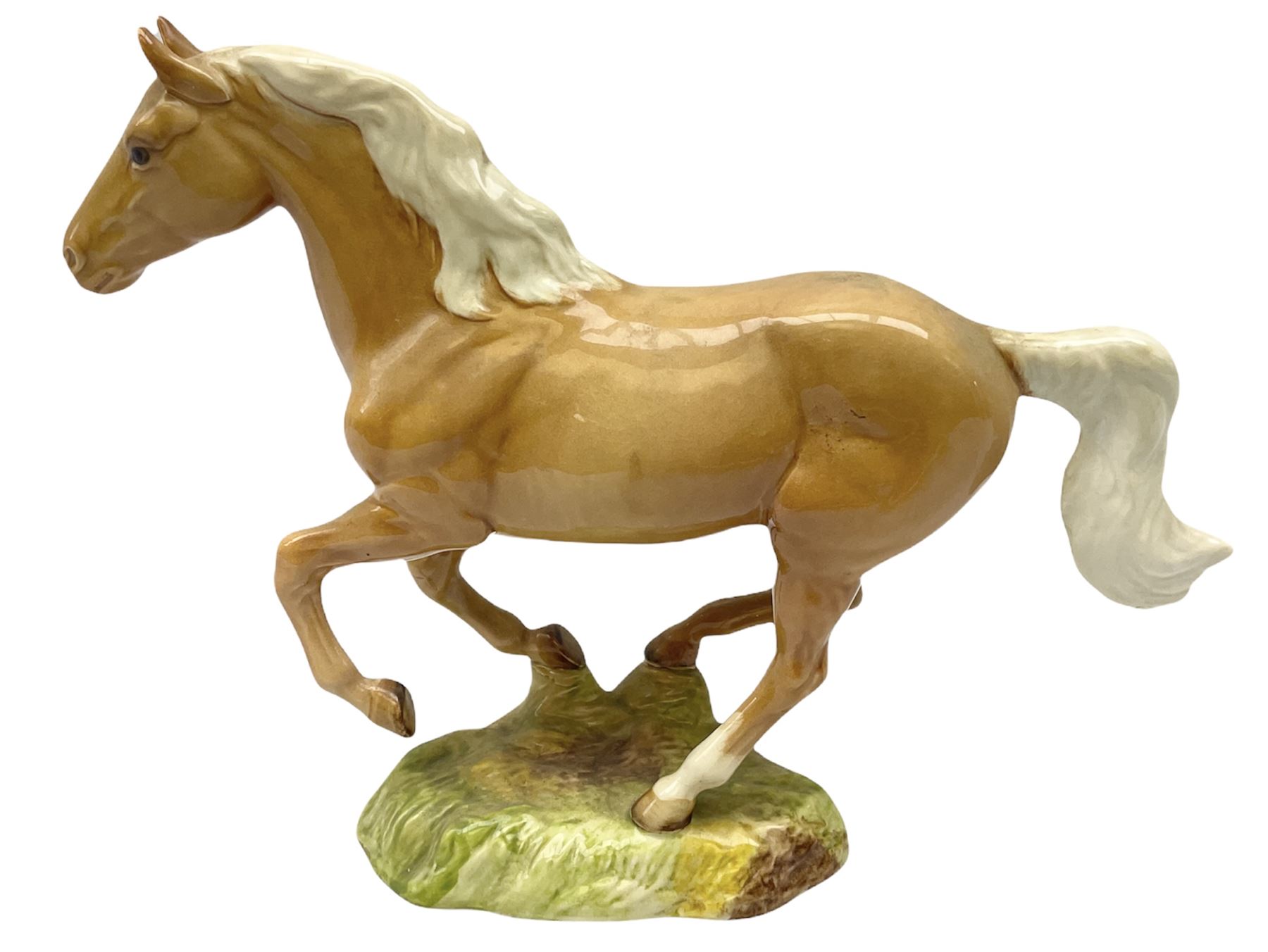 Beswick figure of cantering Palomino horse on base model no 1374, with impressed and printed mark beneath, H18cm