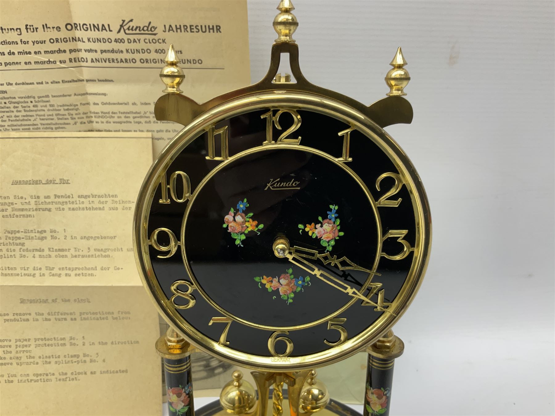 West German Kundo anniversary clock with glass dome, H30cm