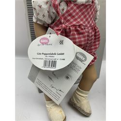 German Gotz articulated vinyl baby doll 'Claire' c1997 with original clothing, hat and labels; artist designed by Sylvia Natterer H35cm; boxed; and small child's wooden cased drum (2)