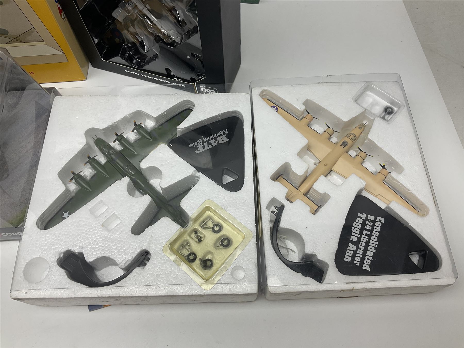 Fifteen modern die-cast models of aircraft by Corgi, Atlas Editions and Ixo including Aviation Archive, War Birds, Fighters of WWII etc; and model of an MGB Sports Car; all boxed (16)