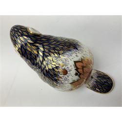 Three Royal Crown Derby paperweights, Puppy, with gold stopper, Riverbank Beaver, limited edition 3007/5000, with gold stopper and Misty, with gold stopper and original box, all with printed mark beneath 