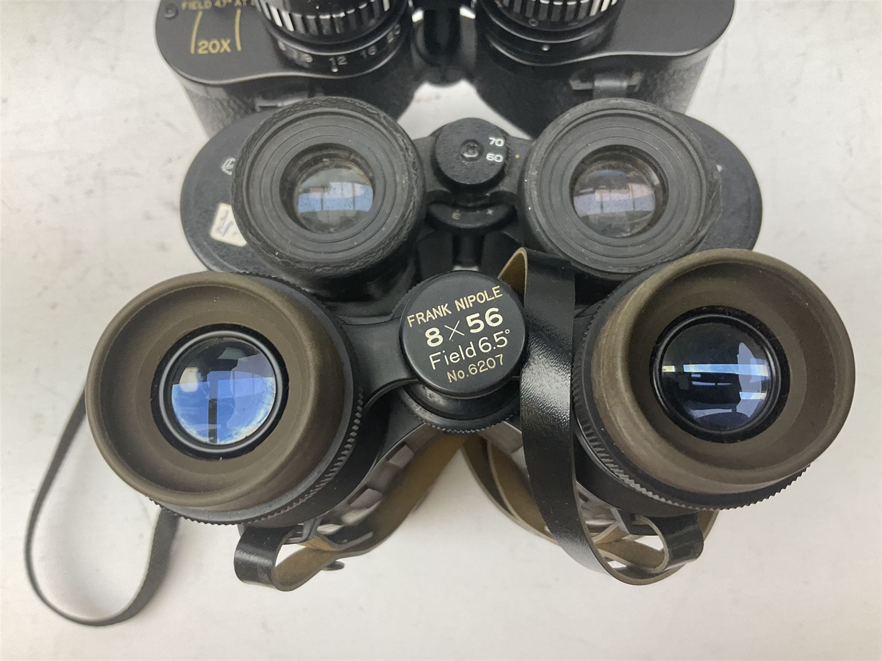 Nine cased pairs of binoculars to include Lieberman & Gortz 12x50, Frank Nipole 8x56, Uniscope, Hoya mark II 8x40, Porst 8x56 etc