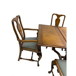 Late 20th century oak dining table, rectangular top with two draw leaf extensions, on turned supports united by moulded hayrake stretchers (180cm - 278cm x 90cm, H76cm); set of eight (6+2) oak dining chairs, shaped cresting rail over shaped splat back, upholster drop-in seat, on cabriole supports united by turned H-shaped stretchers 