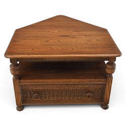 Ercol -  dark elm corner TV stand and coffee table, TV stand with drop triangular leaf, over open recess above a single drawer (H 47cm, D 44cm with leaf 79cm, W 73cm,  the coffee table with chamfered rectangular top with full length undertier, raised on turned supports (H 43cm, D 54cm, W 115cm) 