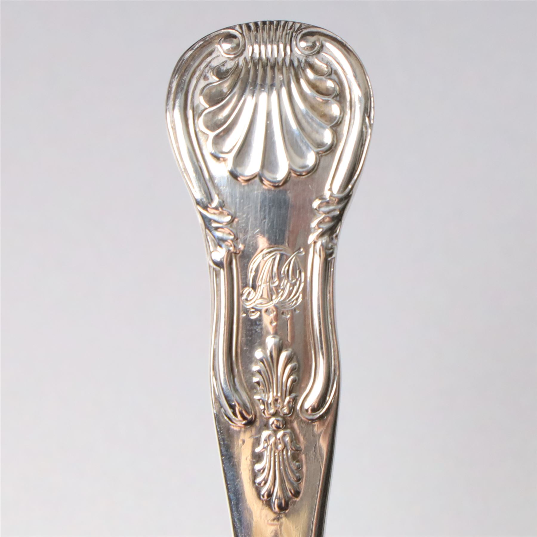 19th century Scottish silver fiddle pattern toddy ladle, Edinburgh 1837 Maker Millidge & Son, another Edinburgh 1835 Maker James McKay, George IV silver sauce ladle with fluted bowl London 1825 Maker Charles Eley and an Edwardian sauce ladle (4)
