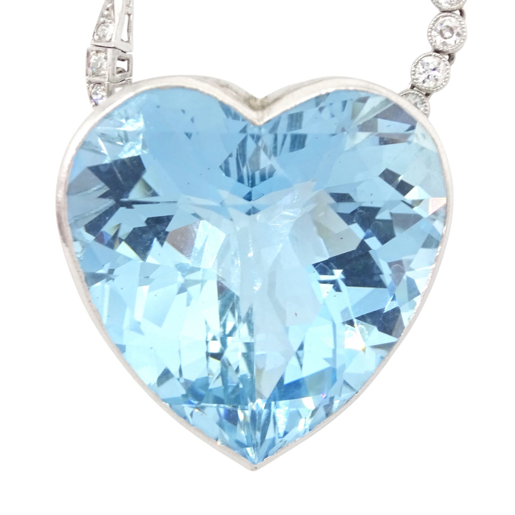 Platinum aquamarine and diamond pendant / brooch, the large faceted heart cut aquamarine, mounted within an openwork heart design gallery, suspending from a polished and milgrain set old cut diamond pendant, with bow design brooch top, set with further old cut diamonds and a single marquise cut diamond, in fitted velvet and silk lined box by Bloom & Sons, London, aquamarine approx 55.00 carat, total diamond weight approx 0.60 carat