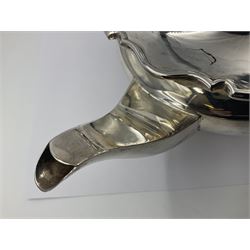 1920s five-piece silver tea service, comprising teapot, coffee pot, hot water pot, twin handled open sucrier and milk jug, each of squat circular form with shaped rim, the teapot, coffee pot and hot water pot each with ebonised handle and finial, the sucrier and milk jug with acanthus capped scroll handles, all upon circular foot, hallmarked R F Mosley & Co, Sheffield 1926 & 1927, tallest H24cm