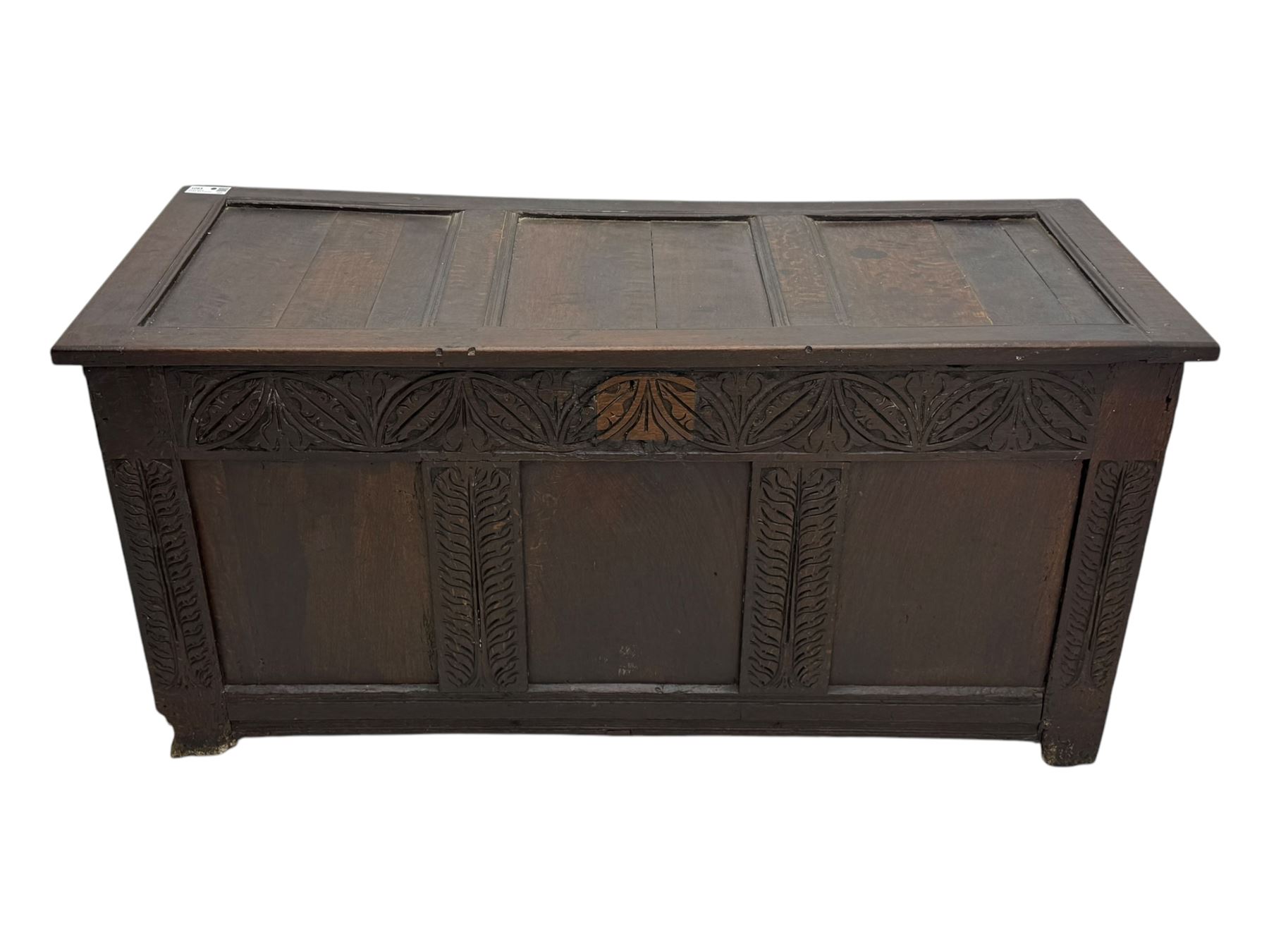18th-century carved oak blanket chest with hand-carved floral and leaf motifs 