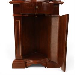 Victorian design mahogany corner cabinet, shaped carved cresting above bowed glazed upper door, with panelled side uprights, lower drawer over cupboard door decorated with floral marquetry, on plinth base