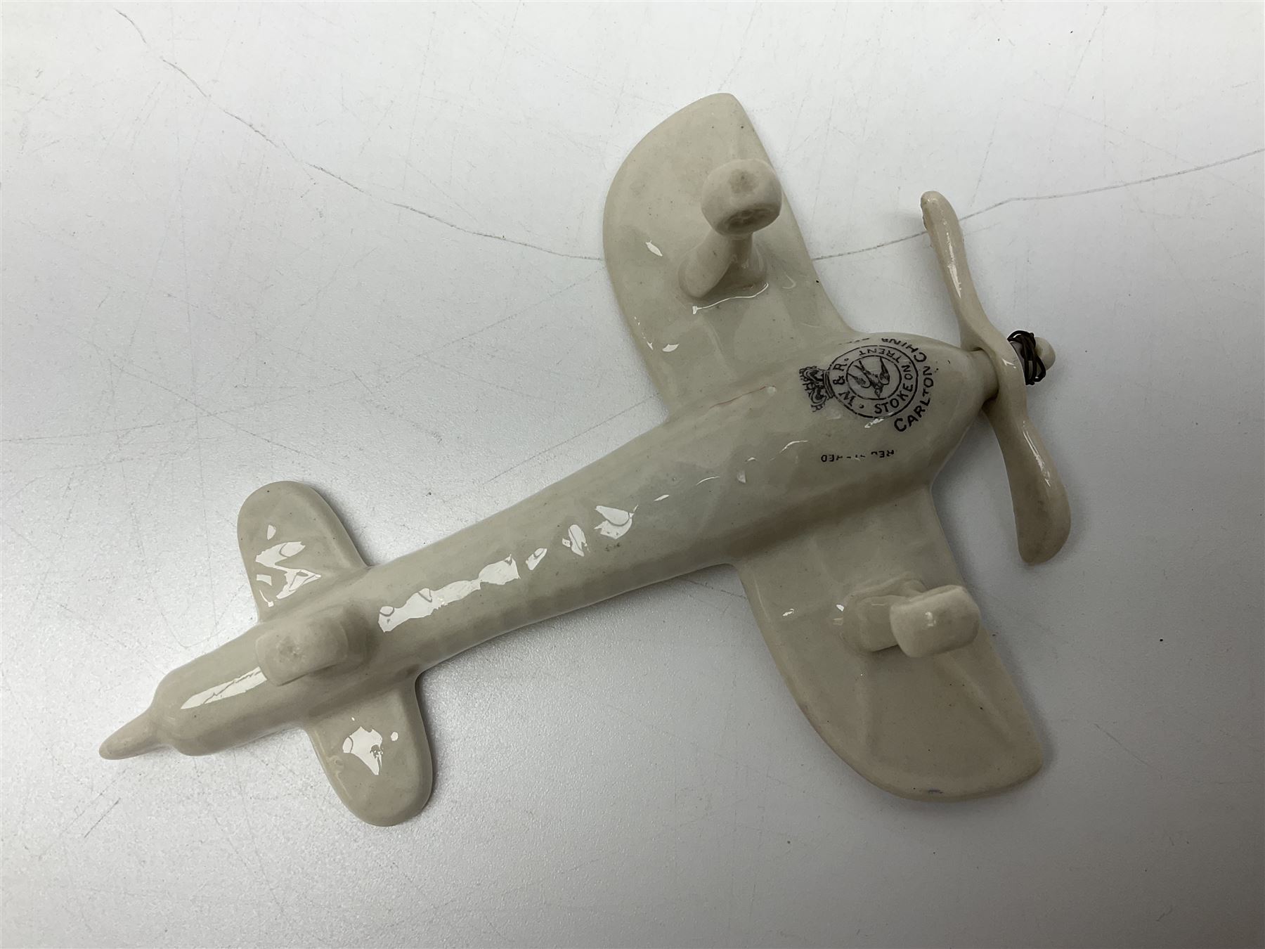 Ten WW1 crested china military models comprising submarine, four ships including Lusitania, four Zeppelins/balloons and an aircraft; various makers including Arcadian China, Swan China, Carlton China, Waterfall, Grafton China etc; various crests including Saint Neots, Great Yarmouth, Tewksbury, Swanage, Simons Town, Hull etc (10)