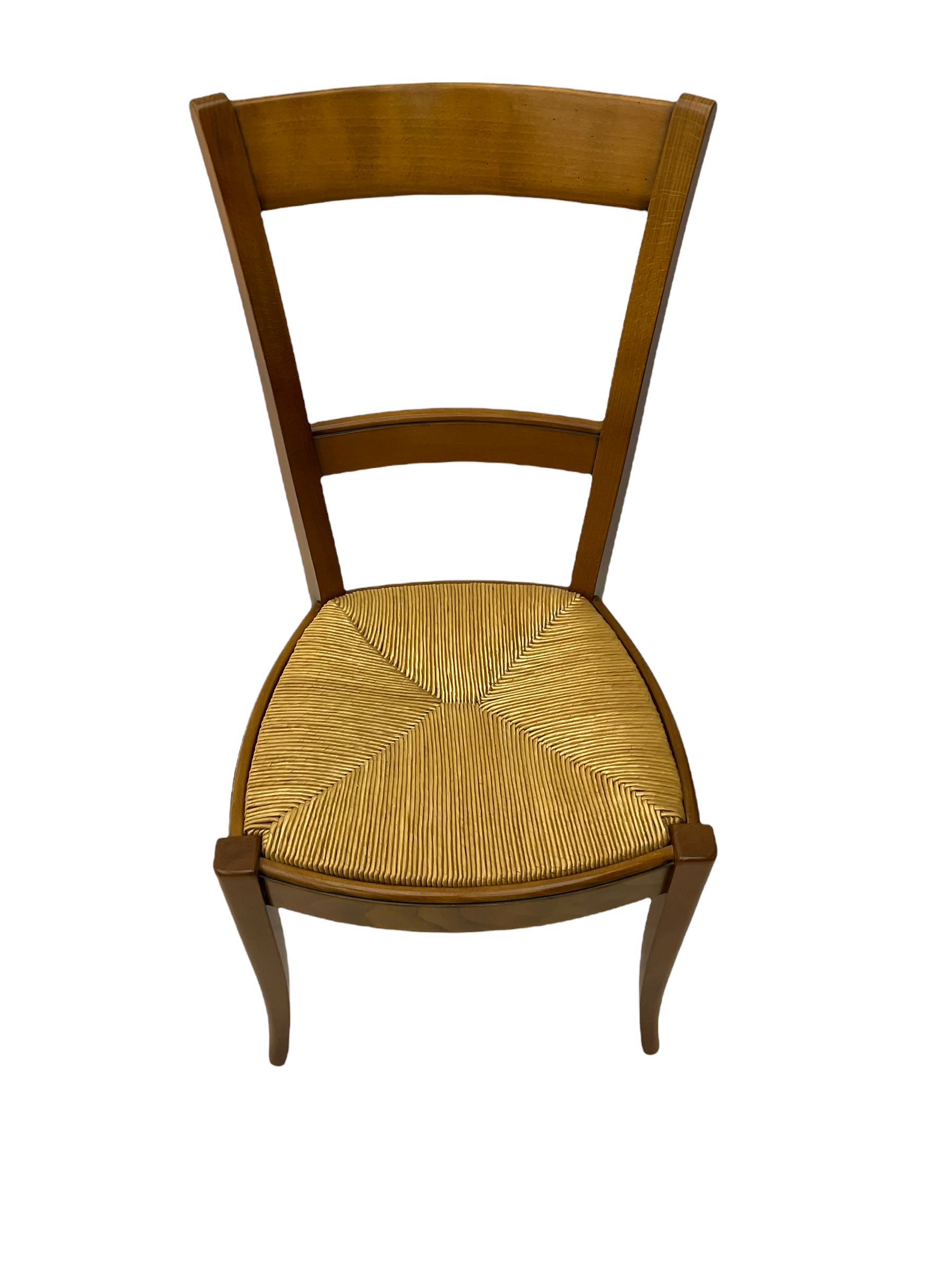 Grange Furniture cherry wood dining table, and eight chairs with rush seats