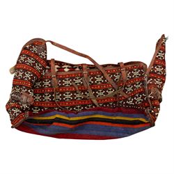 South West Persian Qashqai bag, woven body decorated with bands of geometric motifs in red, ivory and dark tones, with leather fittings and straps, underside with flatweave stripped bands 