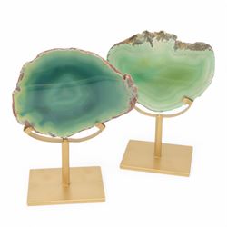 Pair of green agate slices, polished with rough edges raised upon gilt metal stands, H21cm