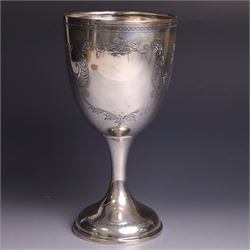 Early 20th century silver trophy cup, with engraved foliate and scrolling decoration upon a domed circular foot, hallmarked Joseph Gloster Ltd, Birmingham 1919, H18cm