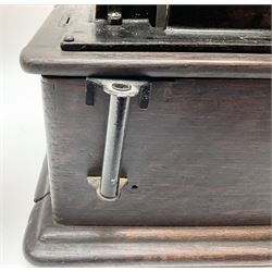 Edison Standard Phonograph with oak base (no cover), the reproducer marked 'Model C', serial no. 634857, last patent date Oct.1905, with black japanned conical horn L33cm; together with five cylinders