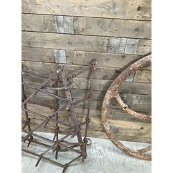Two vintage agricultural harrows and cast iron machinery wheel/gear