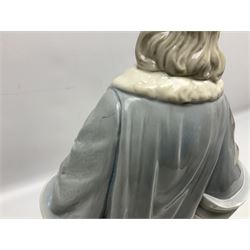 Lladro figure, Columbus, modelled as Christopher Columbus stood by a globe, limited edition 896/1200, no 1432, sculpted by Salvador Furio, with original box, year issued 1982, year retired 1988, H42cm