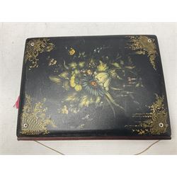 Victorian desk ink blotter, decorated with painted spray of flowers within stylised gilt rococo spandrels with mother of pearl fixings, together with a Victorian photo album containing interior leaves with apertures of various sizes and shapes of portraits surrounded by printed sea and dock scenes, blotter L28cm