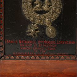 19th century brass coach plate with the arms of Conyngham, inscribed 'Francis Nathaniel 2nd Marquis Conyngham, Knight of St Patrick, Knight Grand Cross of the Hanoverian Guelphic Order', framed and with hand written information to the reverse 26cm x 21cm overall