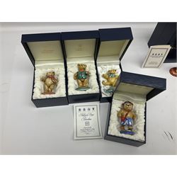Eight Halcyon Days Teddy Bear of the Year figures, from 1993 to 2000, including one example modelled as a bear in Greek dress carrying a torch, one example modelled as a schoolboy and one example in a blue dress, all boxed 