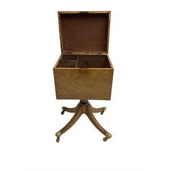 Regency mahogany cellarette on stand, rectangular top with hinged lid, raised on turned pedestal terminating in quadrupod base with brass cups and castors