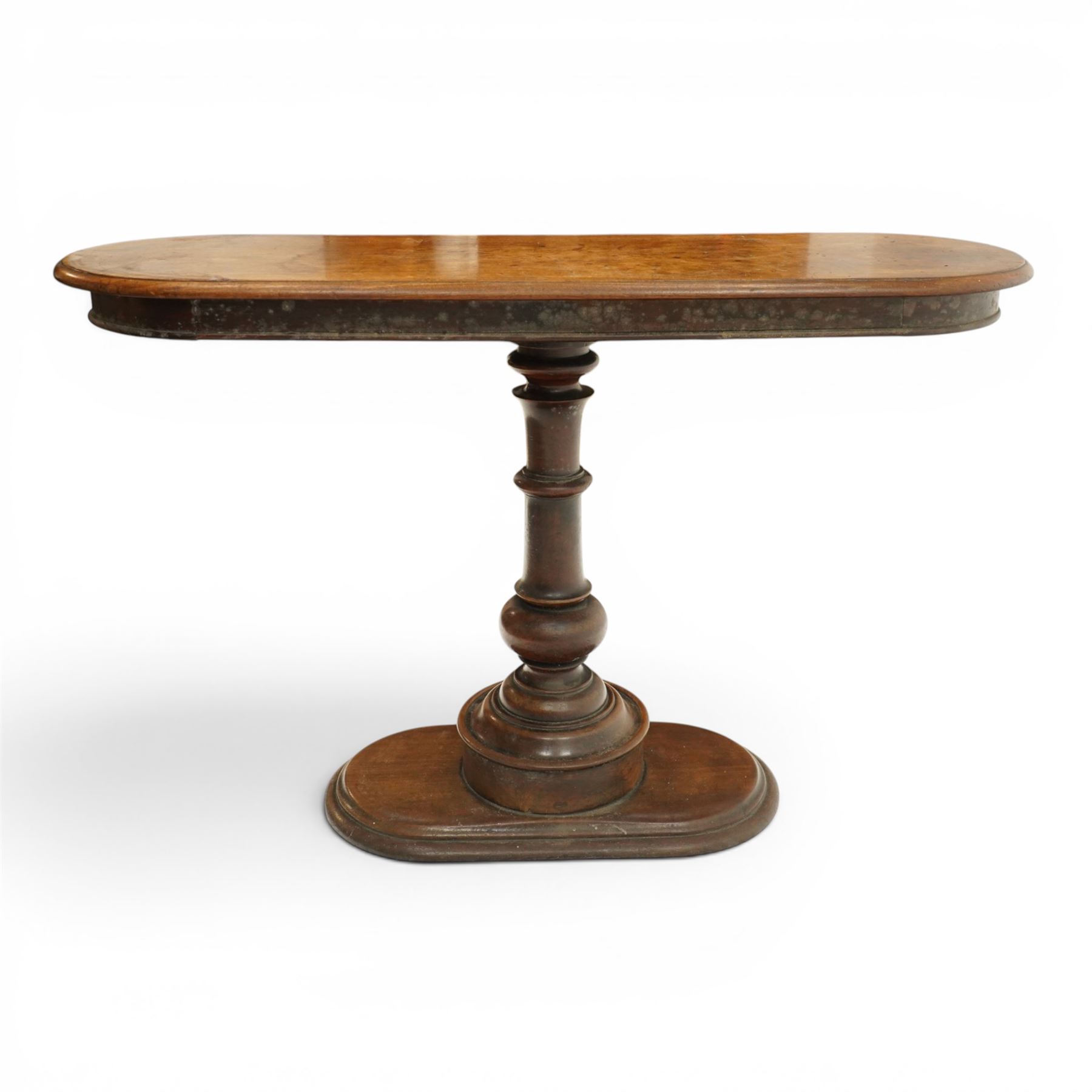 Georgian mahogany console table, the top of oval form, above a turn vasiform column, above an oval plinth base 