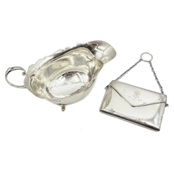  Silver envelope purse by Robert Pringle & Sons, Chester 1912 and silver sauce boat by William Suckling Ltd, Birmingham 1930  