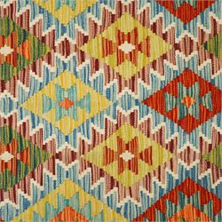 Chobi kilim with staggered diamond and stepped lozenge motifs in a palette of mustard, rust, teal, lilac and cream, the design enclosed by patterned guard stripes