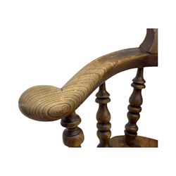 19th century elm and beech smoker's bow armchair, shaped arms over turned spindle gallery and dished seat, on turned supports united by double H-shaped swell turned stretchers 