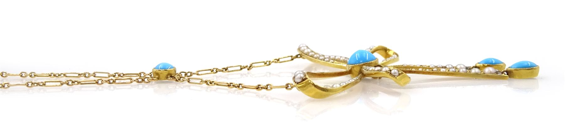 Edwardian 15ct gold turquoise and seed pearl pendant bow necklace, stamped