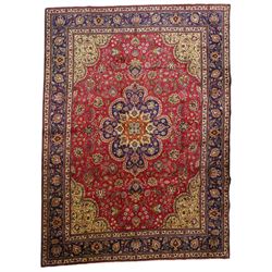 North East Persian Meshad hand-knotted carpet, crimson field with central lobed medallion ...
