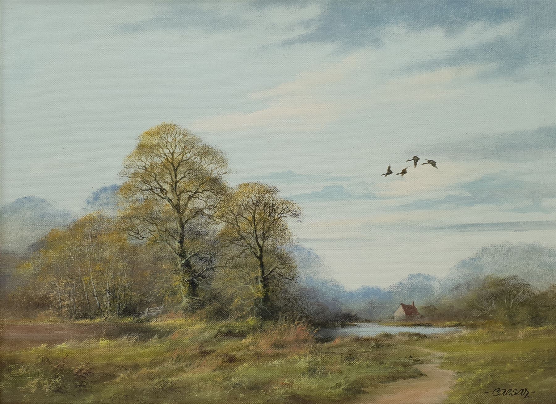 John Caesar Smith (British 1930-): Wooded Landscape with Geese in Flight, oil on canvas signed 29cm x 39cm