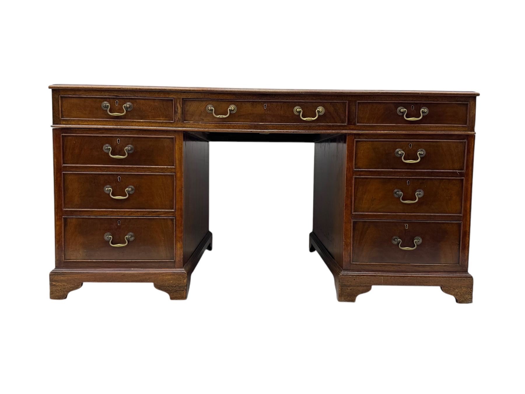 Edwardian mahogany twin pedestal desk, rectangular burgundy leather top moulded edge, over three short drawers with brass swan neck handles, over twin pedestals with graduating drawers supported on bracket feet