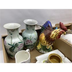 Three table lamps including ceramic floral example and a carved resin example, Wedgwood Jasperware trinket dish and a collection of ceramic pigs including three graduating wall plaques and other collectables, in three boxes 