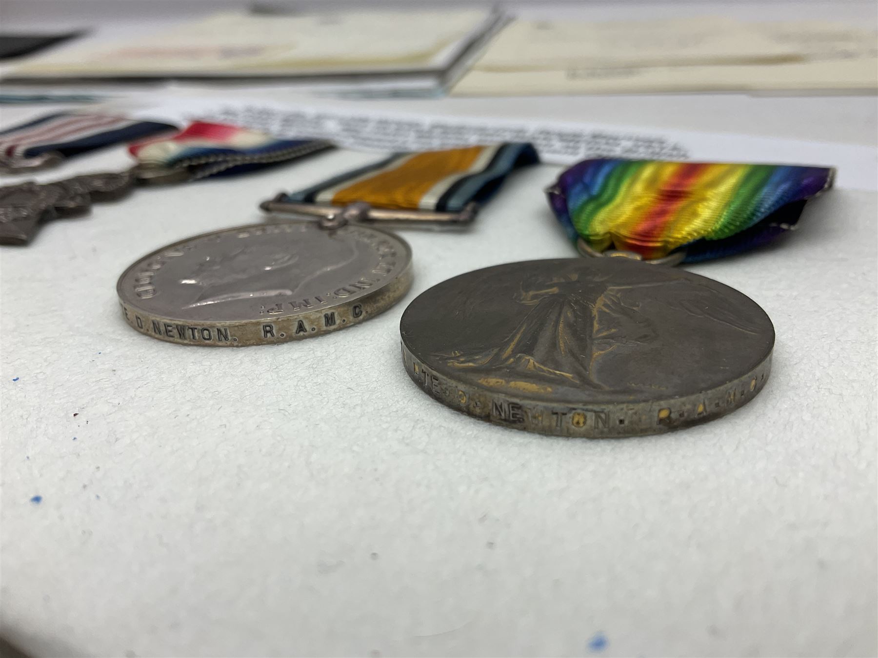 WWI Military Medal awarded to S-3957 Pte. W. Wood Med. Unit R.M. as reported in the London Gazette 14th May 1919 for services at 'the British Offensive 1918 Drocort-Queant Line and subsequent Operations' with archive of research information and original bill of purchase from Spink & Son dated 5/9/1957; together with a WWI group of three medals comprising British War Medal, Victory Medal and 1914-15 Star awarded to 1732 Pte. D. Newton R.A.M.C.