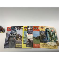 Seven plastic model construction kits - Airfix Vodaphone McLaren Mercedes racing car and Jaguar 'E' Type, Revell Ferrari F310B racing car and four tanks by Airfix, Revell and Tamiya; all boxed in factory sealed transparent packaging; together with an Airfix Spitfire kit tin, various model instruction sheets, catalogues and magazines.