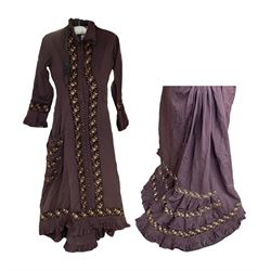 Victorian ladies riding habit, the two-piece construction in brown with embroidered floral velvet edging